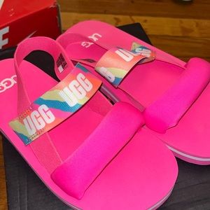 Cute pink UGG sandals Size 2. Worn once, excellent condition.